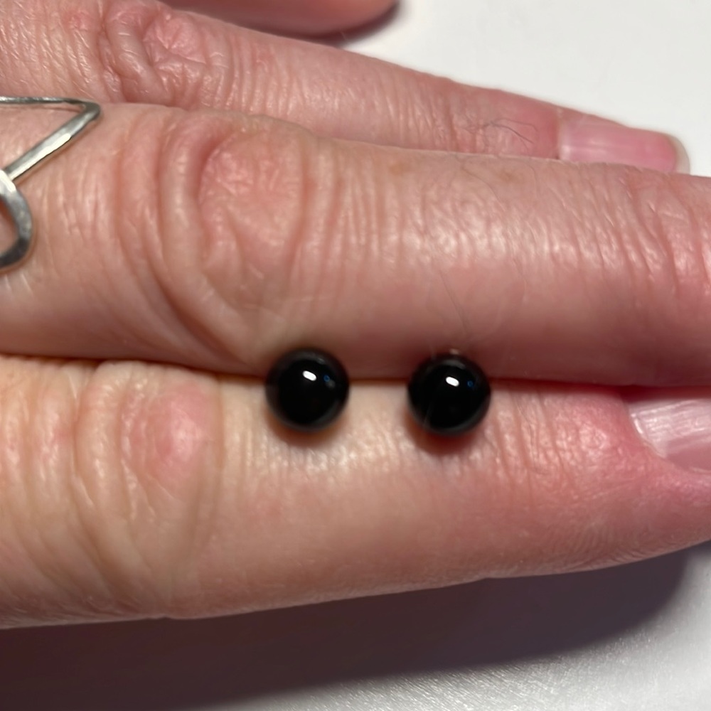 Black round studs